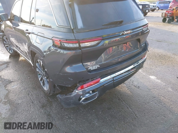 2023 Jeep Grand Cherokee Overland with VIN 1C4RJHDGXP8864365, listed as a IAAI auction lot 40502141 with 3,911 mi miles and . Bid and sale history available at DreamBid. Image 6.