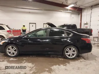 2013 Nissan Altima SV with VIN 1N4BL3AP1DN494400, listed as a IAAI auction lot 41985988 with 114,916 mi miles and . Bid and sale history available at DreamBid. Image 14.