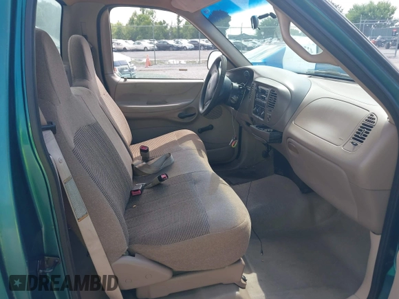 1997 Ford F-150 with VIN 1FTDF17W0VKA72683, listed as a IAAI auction lot 42760251 with 235,962 mi miles and . Bid and sale history available at DreamBid. Image 5.
