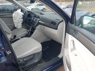 2023 Volkswagen Tiguan SE z VIN 3VVMB7AX3PM006867, wystawiony jako IAAI lot #40793976 z przebiegiem 29 648 mil mil oraz . Historia ofert i sprzedaży dostępna na DreamBid. Obrazek 5.