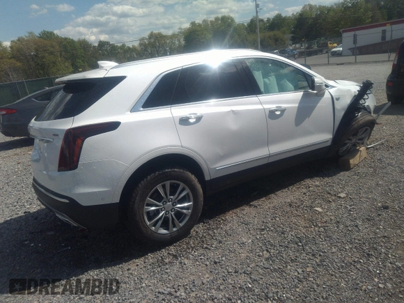 2023 Cadillac XT5 AWD Premium Luxury with VIN 1GYKNDRS5PZ141071, listed as a IAAI auction lot 36571530 with 2,822 mi miles and . Bid and sale history available at DreamBid. Image 4.