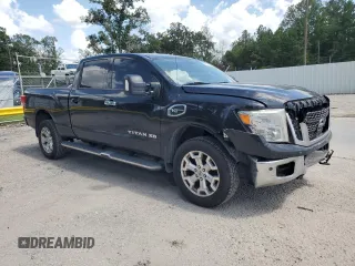 2017 Nissan Titan XD SV with VIN 1N6AA1F25HN549415, listed as a Copart auction lot 64027474 with 186,736 mi miles and Salvage Title. Bid and sale history available at carsss.com. Image 4.
