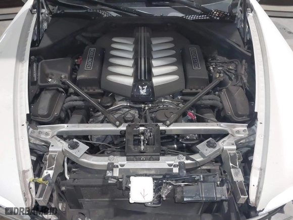 2014 Rolls-Royce Wraith with VIN SCA665C59EUX84389, listed as a IAAI auction lot 41413368 with 57,951 mi miles. Bid and sale history available at carsss.com. Image 10.