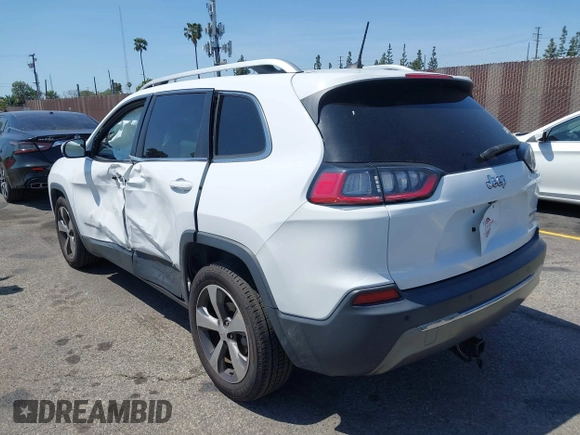 2019 Jeep Cherokee Limited z VIN 1C4PJLDB0KD396077, wystawiony jako IAAI lot #41972498 z przebiegiem 128 312 mil mil oraz . Historia ofert i sprzedaży dostępna na DreamBid. Obrazek 3.