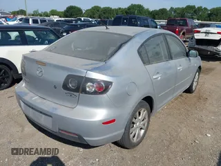 2007 Mazda 3 S Touring with VIN JM1BK323771729466, listed as a IAAI auction lot 42254581 with 112,733 mi miles and . Bid and sale history available at DreamBid. Image 4.