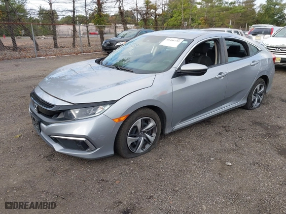 2019 Honda Civic Sedan LX with VIN 2HGFC2F65KH586106, listed as a IAAI auction lot 40486735 with 82,714 mi miles. Bid and sale history available at carsss.com. Image 6.