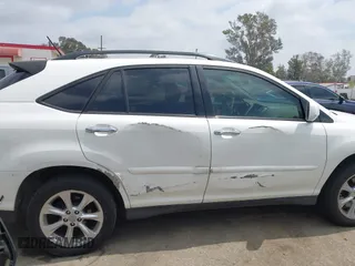 2008 Lexus RX 350 z VIN JTJGK31UX80013763, wystawiony jako IAAI lot #42121125 z przebiegiem 171 038 mil mil oraz . Historia ofert i sprzedaży dostępna na DreamBid. Obrazek 13.