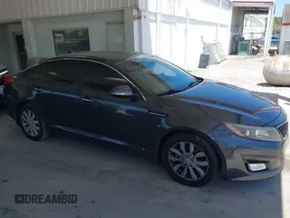 2015 Kia Optima EX z VIN 5XXGN4A7XFG497858, wystawiony jako IAAI lot #42156724 z przebiegiem 109 028 mil mil oraz . Historia ofert i sprzedaży dostępna na DreamBid. Obrazek 13.