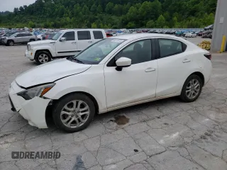 2016 Scion iA z VIN 3MYDLBZV3GY100873, wystawiony jako Copart lot #58972413 z przebiegiem 223 551 mil mil oraz . Historia ofert i sprzedaży dostępna na DreamBid. Obrazek 1.