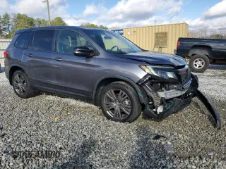 2019 Honda Passport EX-L with VIN 5FNYF7H5XKB001901, listed as a Copart auction lot 87186504 with 93,540 mi miles and Salvage Title. Bid and sale history available at carsss.com. Image 4.