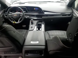 2023 Cadillac Escalade ESV AWD V-Series z VIN 1GYS4SK93PR229583, wystawiony jako Copart lot #57963475 z przebiegiem 19 649 mil mil oraz Szkody całkowita. Historia ofert i sprzedaży dostępna na DreamBid. Obrazek 8.