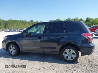 2014 Subaru Forester 2.5i with VIN JF2SJAAC0EH477090, listed as a IAAI auction lot 42080193 with 277,527 mi miles and . Bid and sale history available at DreamBid. Image 14.
