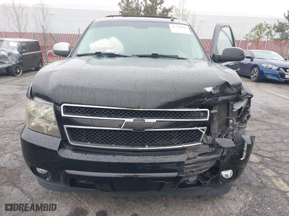 2010 Chevrolet Suburban LT with VIN 1GNUKJE35AR118585, listed as a IAAI auction lot 41730021 with 195,692 mi miles. Bid and sale history available at carsss.com. Image 12.