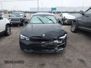 2020 BMW 3 Series 330i xDrive with VIN WBA5R7C08LFH44012, listed as a IAAI auction lot 41252675 with 57,486 mi miles. Bid and sale history available at carsss.com. Image 11.