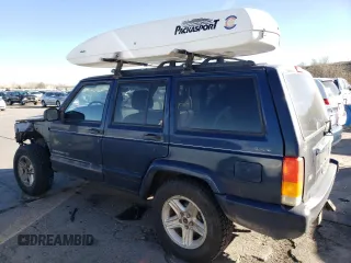 2000 Jeep Cherokee Limited with VIN 1J4FF68S0YL250926, listed as a Copart auction lot 84837244 with 141,020 mi miles and Salvage Title. Bid and sale history available at carsss.com. Image 2.