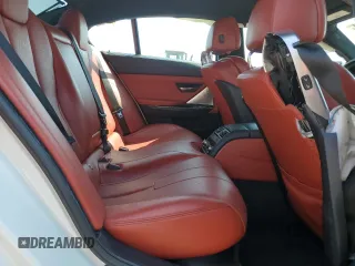 2015 BMW M6 z VIN WBS6C9C5XFD467711, wystawiony jako Copart lot #66574644 z przebiegiem 101 001 mil mil oraz Szkody całkowita. Historia ofert i sprzedaży dostępna na DreamBid. Obrazek 11.