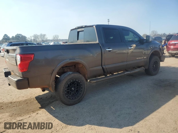 2016 Nissan Titan XD S with VIN 1N6AA1F40GN514555, listed as a Copart auction lot 46584855 with 312,334 mi miles and Salvage Title. Bid and sale history available at carsss.com. Image 3.