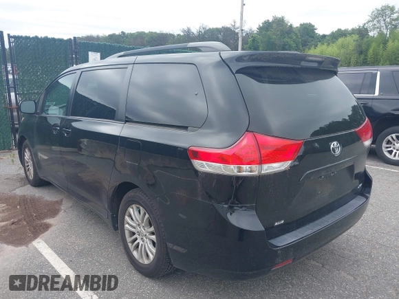 2013 Toyota Sienna XLE AAS with VIN 5TDYK3DCXDS302949, listed as a IAAI auction lot 42611370 with 236,663 mi miles and . Bid and sale history available at DreamBid. Image 3.