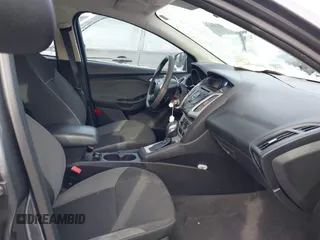 2013 Ford Focus SE with VIN 1FADP3K28DL112777, listed as a IAAI auction lot 41386940 with 107,893 mi miles. Bid and sale history available at carsss.com. Image 5.
