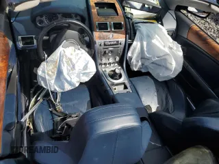 2006 Aston Martin DB9 z VIN SCFAB02A26GB04627, wystawiony jako Copart lot #68314504 z przebiegiem Nie podano mil oraz Szkody całkowita. Historia ofert i sprzedaży dostępna na DreamBid. Obrazek 8.