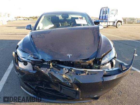 2024 Tesla Model 3 with VIN 5YJ3E1EA7RF853483, listed as a IAAI auction lot 40863575 with 1,173 mi miles and . Bid and sale history available at carsss.com. Image 6.