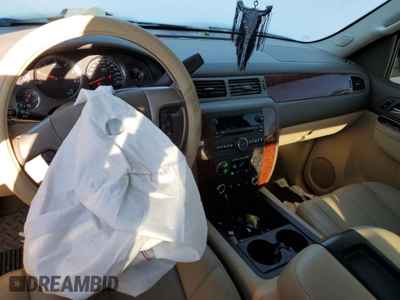 2013 Chevrolet Silverado 1500 LTZ with VIN 1GCRKTE74DZ296814, listed as a Copart auction lot 74476753 with 130,643 mi miles and Salvage Title. Bid and sale history available at DreamBid. Image 8.