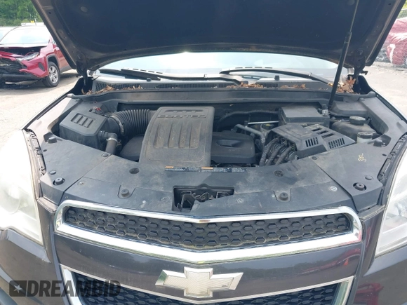 2015 Chevrolet Equinox LT z VIN 2GNFLFEK0F6385131, wystawiony jako IAAI lot #42427055 z przebiegiem 110 231 mil mil oraz . Historia ofert i sprzedaży dostępna na DreamBid. Obrazek 10.