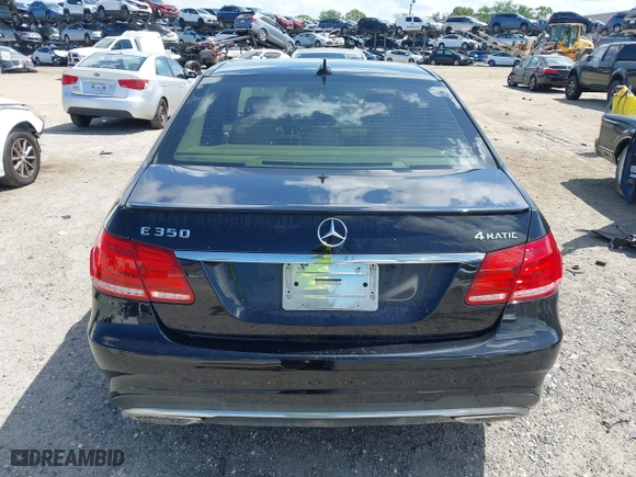 2014 Mercedes-Benz E-Class E 350 Luxury with VIN WDDHF8JB7EA791635, listed as a IAAI auction lot 41999708 with 133,509 mi miles. Bid and sale history available at carsss.com. Image 16.