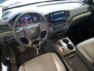2020 Honda Passport EX-L with VIN 5FNYF8H57LB011549, listed as a Copart auction lot 59123735 with 127,797 mi miles and Salvage title. Bid and sale history available at DreamBid. Image 8.