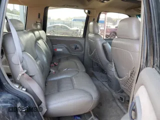 1999 GMC Yukon with VIN 1GKEK13RXXJ730202, listed as a Copart auction lot 73236834 with 188,567 mi miles and Non Repairable. Bid and sale history available at carsss.com. Image 11.