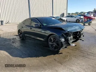 2023 Genesis G70 2.0T with VIN KMTG34TA5PU129955, listed as a Copart auction lot 82980774 with 12,625 mi miles and Salvage Title. Bid and sale history available at DreamBid. Image 14.
