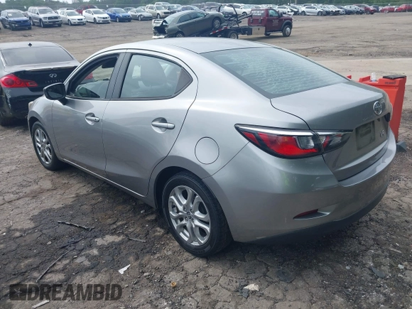 2016 Scion iA with VIN 3MYDLBZV7GY123315, listed as a IAAI auction lot 42168770 with 136,035 mi miles. Bid and sale history available at carsss.com. Image 3.