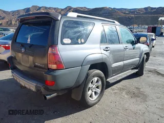 2003 Toyota 4Runner SR5 z VIN JTEZU14R230016890, wystawiony jako IAAI lot #41334769 z przebiegiem Nie podano mil oraz . Historia ofert i sprzedaży dostępna na DreamBid. Obrazek 4.