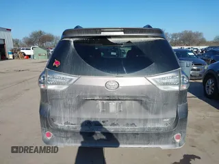 2014 Toyota Sienna SE with VIN 5TDXK3DC7ES482954, listed as a IAAI auction lot 41197465 with 160,107 mi miles and . Bid and sale history available at DreamBid. Image 17.