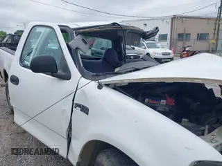 2003 Ford F-150 XL with VIN 1FTRF17253NB76259, listed as a IAAI auction lot 42343861 with Not provided miles and . Bid and sale history available at DreamBid. Image 13.