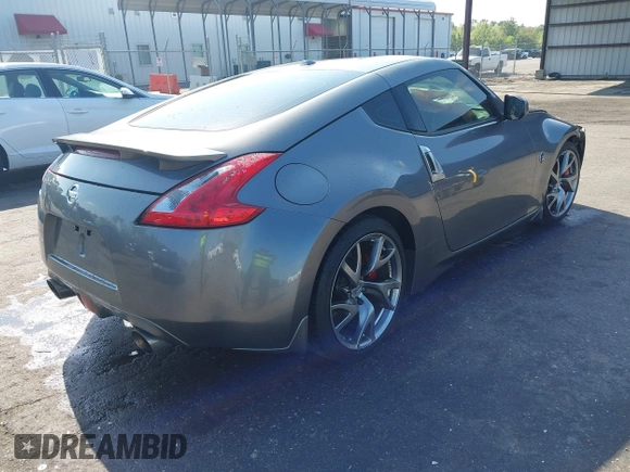 2013 Nissan 370Z with VIN JN1AZ4EH1DM880983, listed as a IAAI auction lot 41937876 with 130,613 mi miles. Bid and sale history available at carsss.com. Image 4.