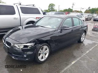 2018 BMW 3 Series 330i xDrive with VIN WBA8D9G50JNU69376, listed as a IAAI auction lot 41971138 with 61,551 mi miles. Bid and sale history available at carsss.com. Image 2.