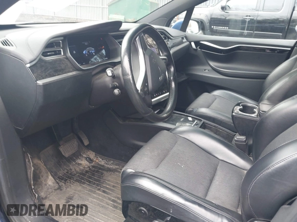 2016 Tesla Model X 70D with VIN 5YJXCBE20GF016173, listed as a IAAI auction lot 41809725 with 116,198 mi miles. Bid and sale history available at carsss.com. Image 5.