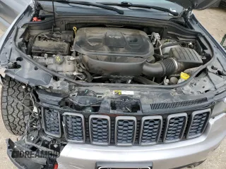 2018 Jeep Grand Cherokee Trailhawk with VIN 1C4RJFLG8JC164774, listed as a Copart auction lot 51699845 with 104,467 mi miles and Salvage title. Bid and sale history available at DreamBid. Image 12.