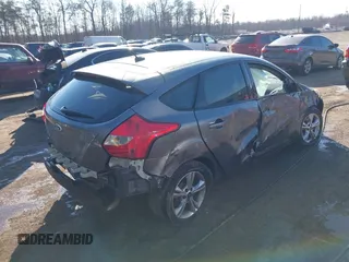 2013 Ford Focus SE with VIN 1FADP3K28DL323879, listed as a IAAI auction lot 41449022 with 133,735 mi miles. Bid and sale history available at carsss.com. Image 4.