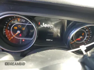 2021 Jeep Gladiator Sport S with VIN 1C6JJTAG5ML606050, listed as a Copart auction lot 45221215 with 43,529 mi miles and Salvage title. Bid and sale history available at DreamBid. Image 9.