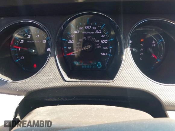 2011 Ford Taurus SE with VIN 1FAHP2DW1BG165371, listed as a IAAI auction lot 42164608 with 186,485 mi miles. Bid and sale history available at carsss.com. Image 7.