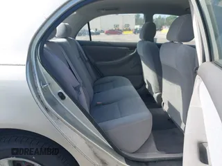 2003 Toyota Corolla CE with VIN JTDBR32E130010551, listed as a IAAI auction lot 42204515 with 129,759 mi miles. Bid and sale history available at carsss.com. Image 8.