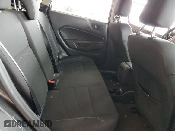 2017 Ford Fiesta SE z VIN 3FADP4BJ9HM165523, wystawiony jako Copart lot #70295532 z przebiegiem 91 318 mil mil oraz Szkoda całkowita • Salvage title. Historia ofert i sprzedaży dostępna na DreamBid. Obrazek 10.