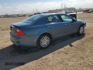 2012 Ford Fusion Hybrid z VIN 3FADP0L33CR288819, wystawiony jako Copart lot #56697025 z przebiegiem 65 486 mil mil oraz Szkoda całkowita • Salvage title. Historia ofert i sprzedaży dostępna na DreamBid. Obrazek 3.