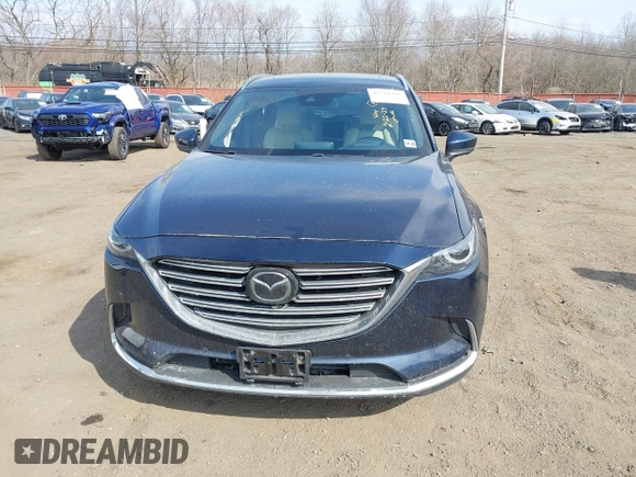 2021 Mazda CX-9 Grand Touring with VIN JM3TCBDY7M0540359, listed as a IAAI auction lot 41711366 with 47,391 mi miles and . Bid and sale history available at carsss.com. Image 12.