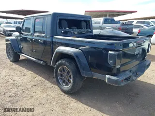 2023 Jeep Gladiator Overland with VIN 1C6HJTFG2PL564318, listed as a IAAI auction lot 41637657 with 30,368 mi miles. Bid and sale history available at carsss.com. Image 3.