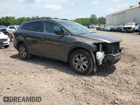 2015 Mazda CX-9 Touring with VIN JM3TB3CV3F0455294, listed as a Copart auction lot 62056495 with Not provided miles and Salvage title. Bid and sale history available at DreamBid. Image 4.