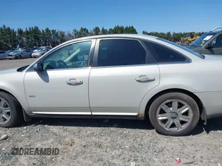2008 Mercury Sable Premier z VIN 1MEHM42W28G613576, wystawiony jako IAAI lot #41900783 z przebiegiem 176 028 mil mil oraz . Historia ofert i sprzedaży dostępna na DreamBid. Obrazek 14.