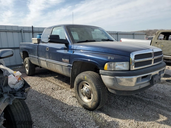 2000 Dodge Ram 2500 with VIN 3B7KF2362YG132087, listed as a Copart auction lot 48668925 with 358,326 mi miles and Salvage Title. Bid and sale history available at carsss.com. Image 4.